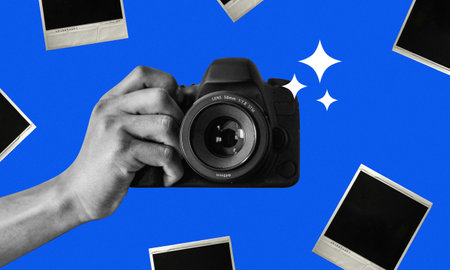 Hand holding DSLR camera collage art, polaroid image on the background. Black and white image on vibrant blue backgroundの写真素材