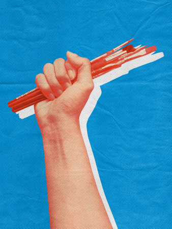 Hand holding paint brushes isolated collage. Tools for painting for artist in pop art styleの写真素材