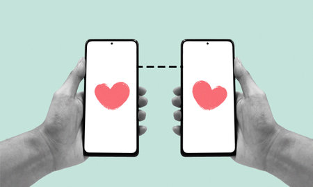 Online love connection concept. Two hands holding smartphones with heart icon connected together, dating app collage illustration. Long distance relationship.の写真素材