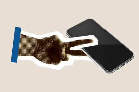 Hand with scissor gesture trying to cut smartphone, symbol of cutting the use of digital technology and social media.の写真素材