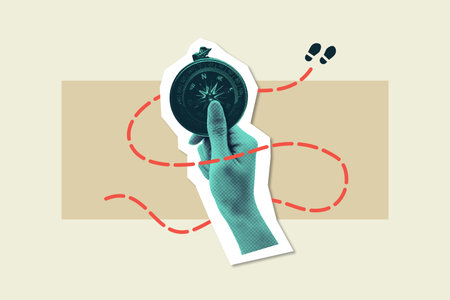 Hand holding a compass with a red dotted line leading towards the direction the compass is pointing.の写真素材