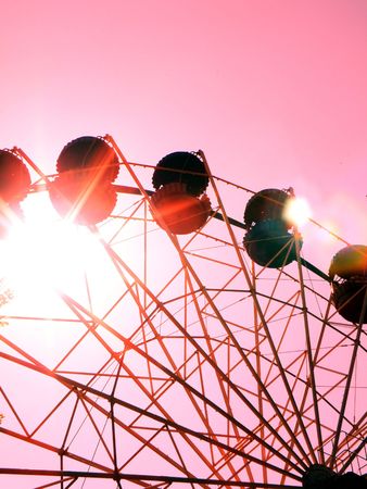 Ferris wheel in town park   