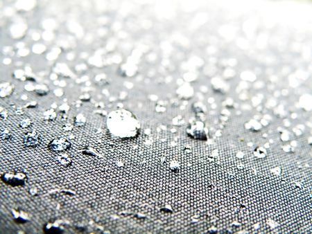 dripped water by close-ups on umbrellaの写真素材