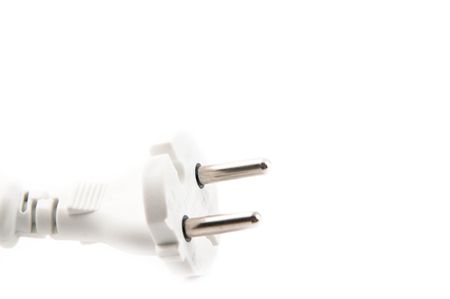 voltage plug and cable - isolated on whiteの写真素材