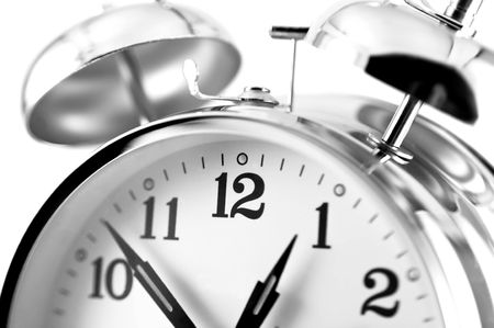 Double bell alarm clock isolated on a white background. 