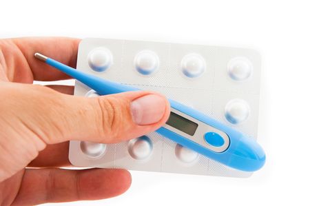 Human hand with digital thermometer and tablet insulated on white background