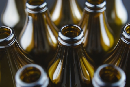 Dark glass beer bottles close upの写真素材