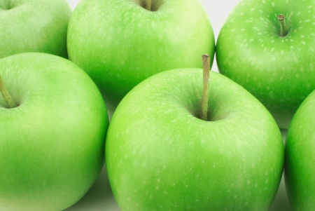 Many tasty and ripe green applesの写真素材