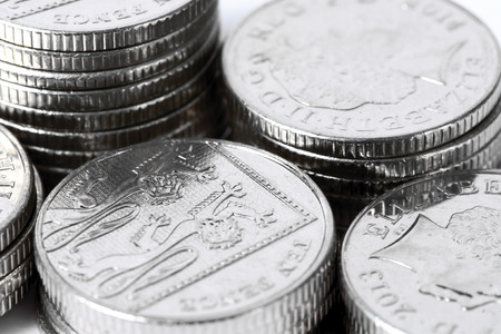 Macro shot of stacks of ten pence coins