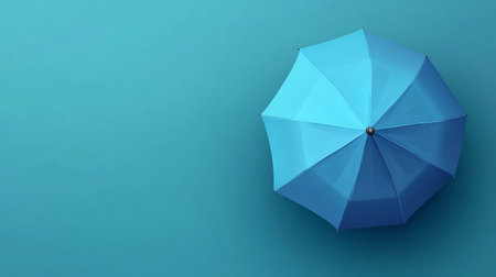 Blue umbrella on blue background. 3D illustration. Copy space.の素材