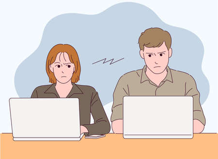 The two are sitting at the table, working on their laptops, staring at each other.のイラスト素材
