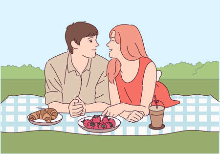 A couple is lying face to face on a mat and smiling, facing each other.のイラスト素材