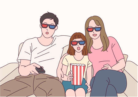 Three families are watching a movie together wearing 3D glasses.のイラスト素材