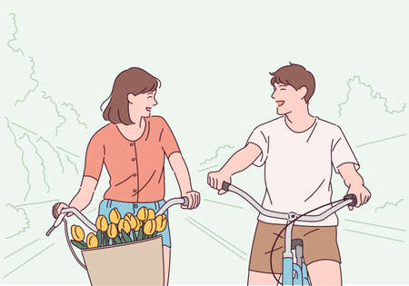 A couple is having fun riding a bicycle.のイラスト素材