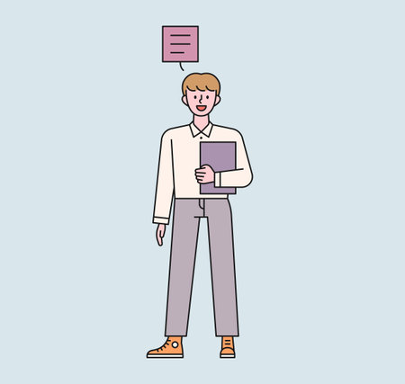 A male student is standing with a notebook. There is a speech bubble above the boy's head and he is speaking. flat design style minimal vector illustration.のイラスト素材