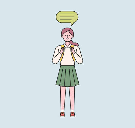 A female student with a school bag is standing. A speech bubble floats above her girl's head. flat design style minimal vector illustration.のイラスト素材