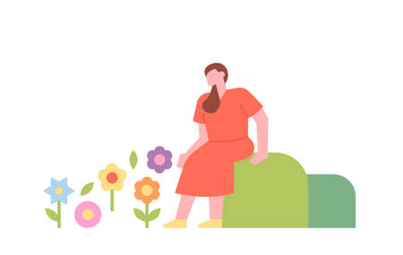A woman is sitting on a small hill and looking at the flowers. flat design style minimal vector illustration.のイラスト素材