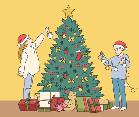 Cute children are decorating the Christmas tree. hand drawn style vector design illustrations.のイラスト素材