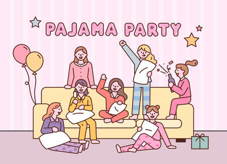 Cute little girls are having a pajama party while sitting around the sofa. flat design style vector illustration.のイラスト素材