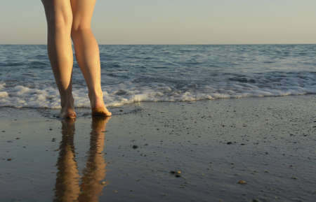      womanish feet,beach,surf,sea,water,sunset,summer,evenin                                        ...