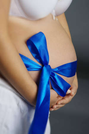 future mother irons a tummyの写真素材