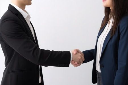 Businessman and businesswoman shaking hands, closeup. Handshake concept. Generative AIの素材