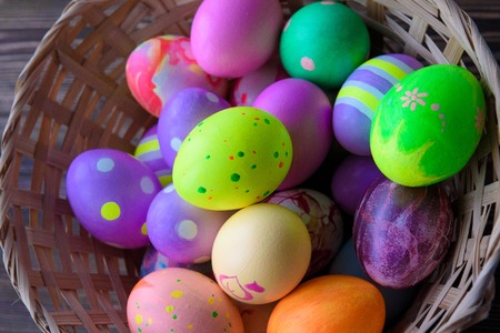 Easter eggs on wooden background, colorful, brightの写真素材