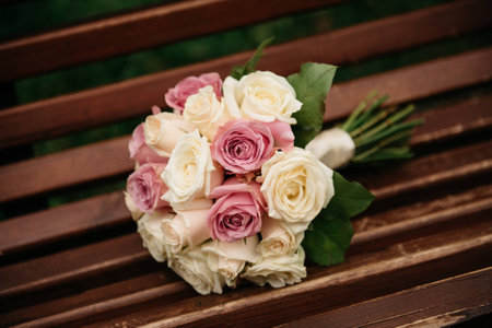 beautiful, fresh bridal bouquet of white and pink rosesの写真素材