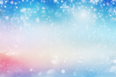 abstract winter background with snowflakes and bokeh lightsの素材