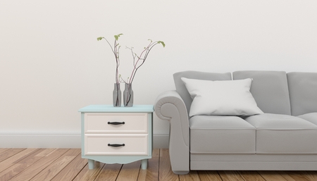 Cabinet with plant and pillow on gray sofa in front of empty white background wall .3D renderingの写真素材