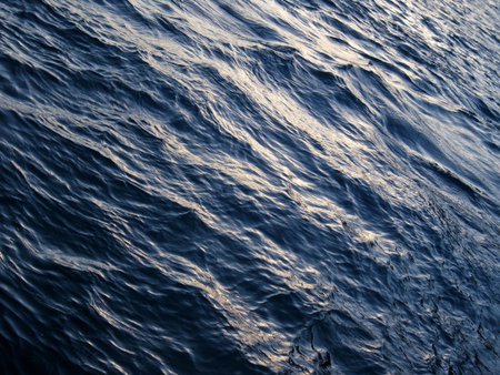 Sea surface with beautiful blue colour and waves in Croatiaの写真素材