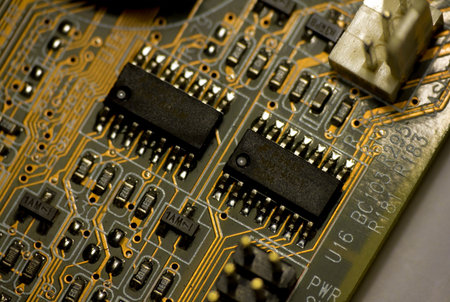 Detail of printed circuit board, old motherboard の写真素材