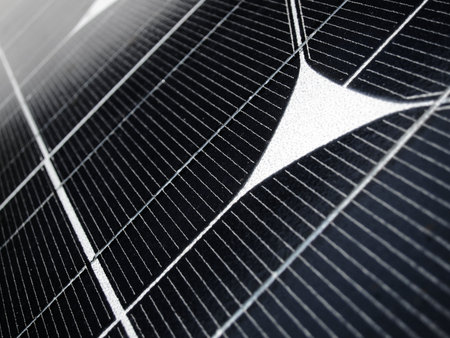 Close detail of solar panel collecting a sunlightの写真素材