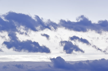 Beautiful skyscape texture with a few blue clouds
