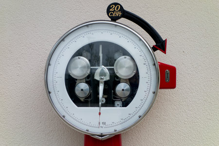 Old paid scale machine to measure weight for money