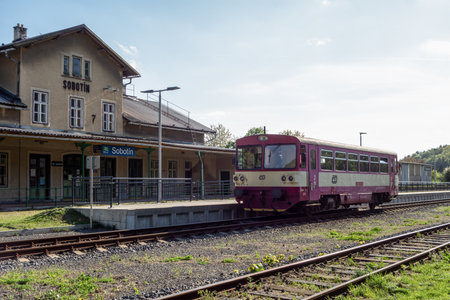 SOBOTIN, CZECH REPUBLIC - APRIL 27, 2018: Locomotive 810 071-1 of Ceske Drahy company in front of Sobotin train station in a strong midday sunny weather. The image was taken on April 27, 2018.のeditorial素材