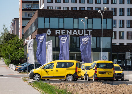 OSTRAVA, CZECH REPUBLIC - MAY 5, 2018: Renault-Dacia dealership in Ostrava with several yellow Dacia Dokker cars ready to be forwarded to Ceska Posta (Czech post office) companyのeditorial素材