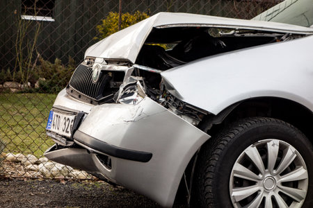 HAVIROV-SUCHA, CZECH REPUBLIC - FEBRUARY 2, 2019: A detail of a silver Czech Skoda Fabia car crashed in a frontal traffic accident. It shows the consequences of the impact.のeditorial素材