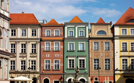 POZNAN, POLAND - AUGUST 11, 2018. Colourful historical houses with ornaments and an arcade at the town square called Stary Rynek in Poznan, Poland, Europeのeditorial素材