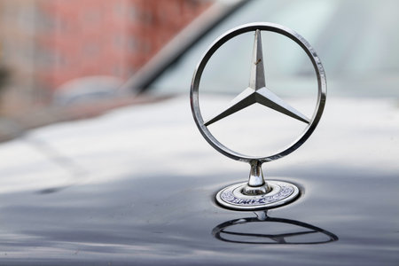 OSTRAVA, CZECH REPUBLIC - APRIL 6, 2019: The chrome emblem of Mercedes-Benz car on a hood. Symbol of the legendary German automobile brand.のeditorial素材