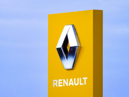 OSTRAVA, CZECH REPUBLIC - JULY 8, 2019: The yellow outdoor sign of Renault car service center and dealership in Ostrava, Czech Republic.のeditorial素材