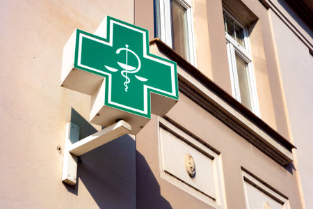 ROUDNICE NAD LABEM, CZECH REPUBLIC - MAY 25, 2019: The typical Czech unified green sign for pharmacies, drugstores and healtcare related shopsのeditorial素材