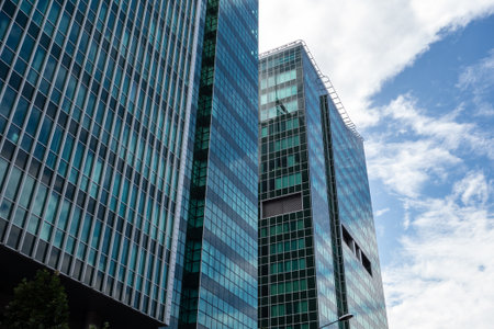 POZNAN, POLAND - AUGUST 11, 2018: Modern office buildings in a downtown business center of Poznan city in Poland with highly reflective glassのeditorial素材