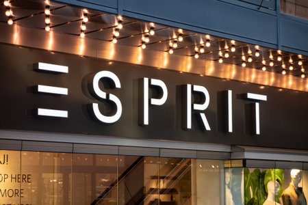 STOCKHOLM, SWEDEN - APRIL 20, 2019: The signage of the fashion company Esprit above an entrance to...