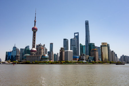 SHANGHAI, CHINA - APRIL, 13, 2019: Cityscape of skyscrapers in Shanghai viewed from historical Bund...
