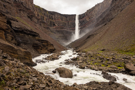 Majestic Hengifoss waterfall in Iceland during overcast weatherの写真素材