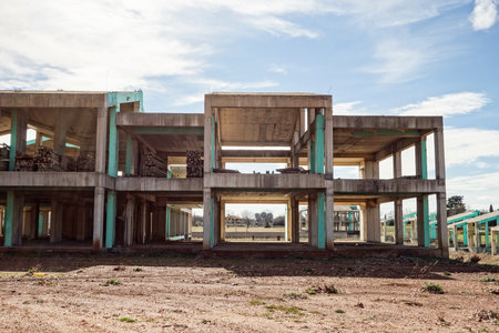 Storehouse under construction in Greece with columns and floors which has not been completed