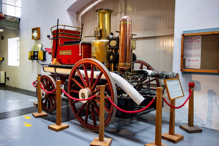 FORRES, SCOTLAND - AUGUST 7, 2019: Historical Glenlossie Fire Engine  as a horse-drawn vehicle displayed at museum in Dallas Dhu Distillery which produces whiskey alcoholのeditorial素材