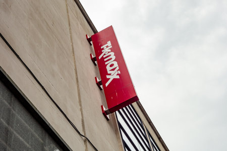 GLASGOW, SCOTLAND - JULY 31, 2019: The logo of TK Maxx outlet which sells fashion for men, women, kids and also homewareのeditorial素材