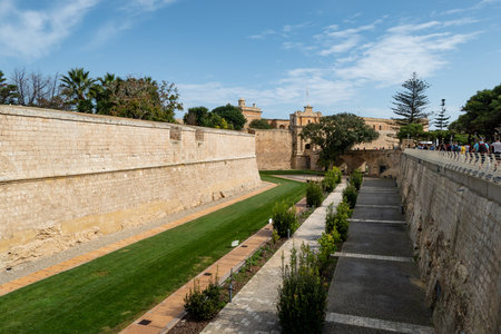 MDINA, MALTA - OCTOBER 2018: Wall of the historical complex of Mdina Castle buildings near Il-Rabatのeditorial素材